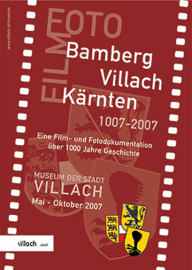 Plakat Sonderausstellung. Roter Hintergrund mit Villach und Kärnten-Wappen. Darauf Weißer Schriftzug mit Veranstaltungsinformationen.